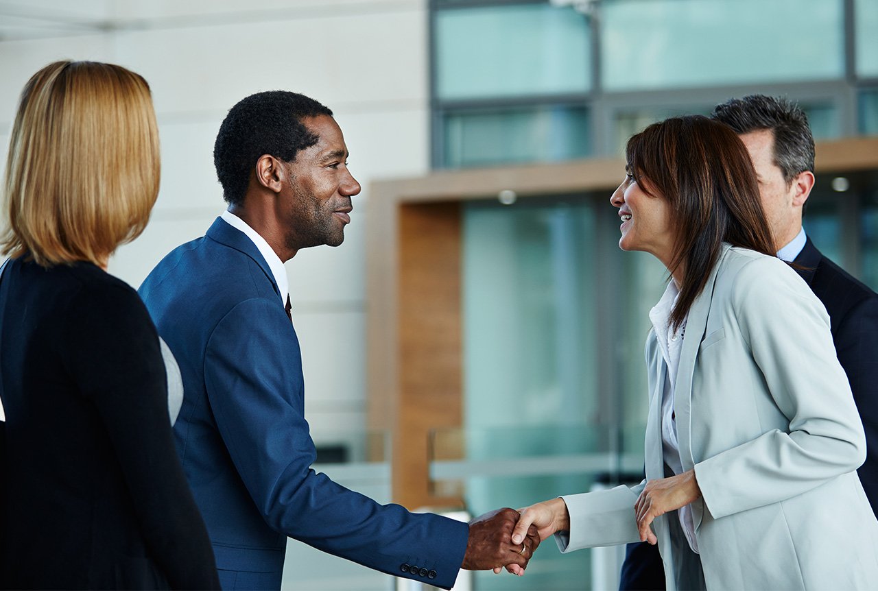 People shaking hands after deciding on the right plastics manufacturing solution